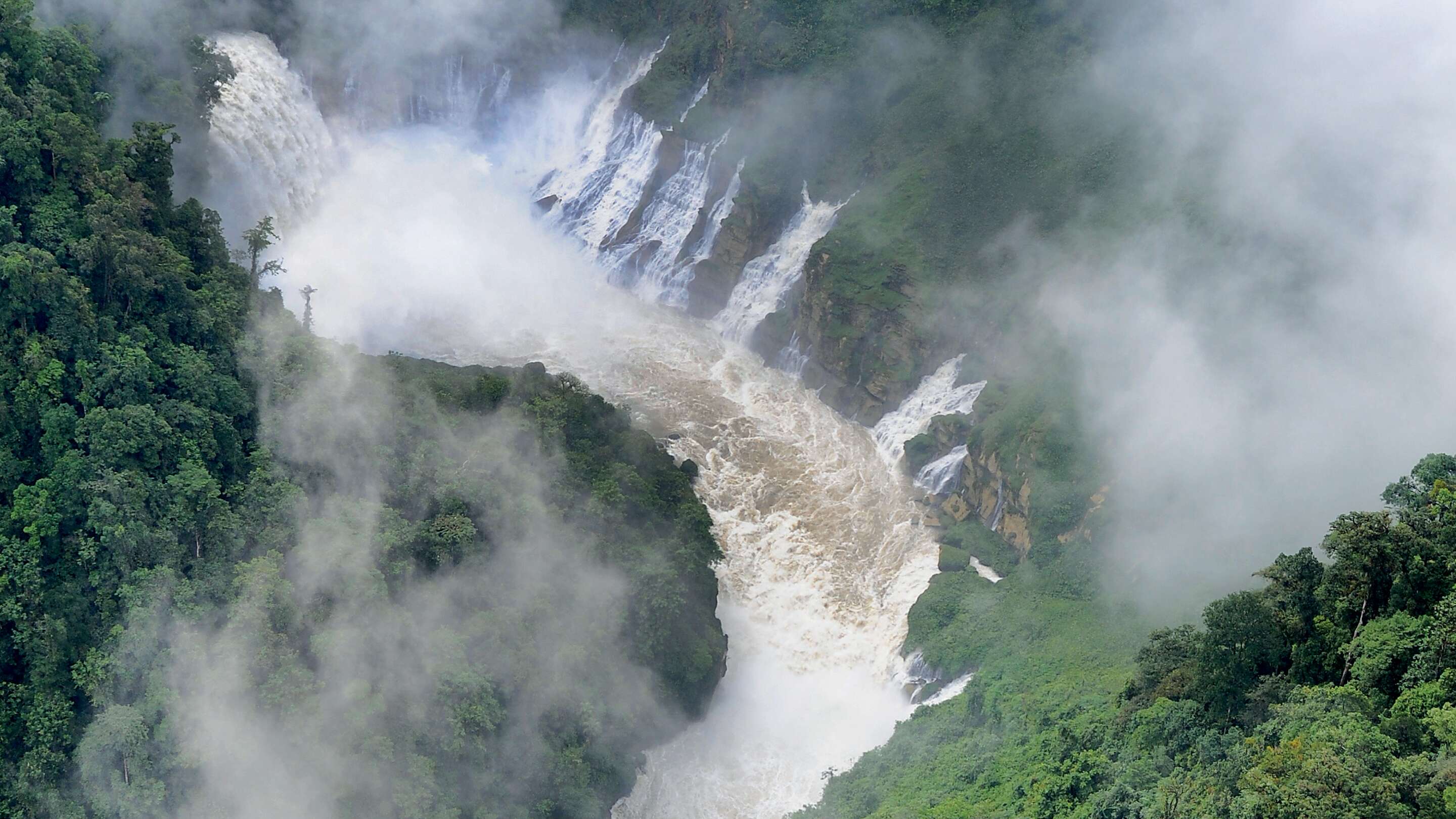 waterfall and river in the forest of Papua New Guinea